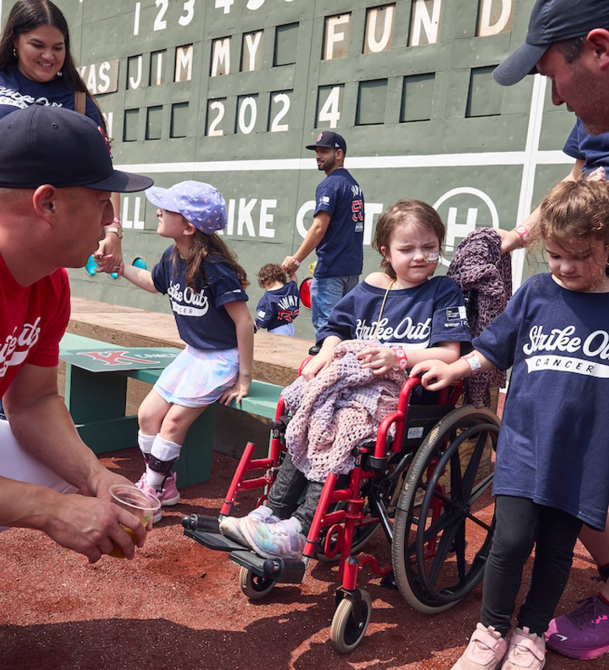 Red Sox player with Dana-Farber patients at Fenway Park