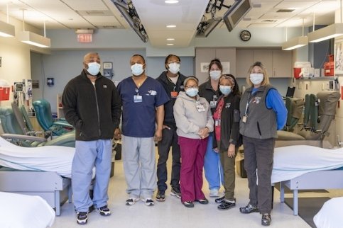 A group of healthcare workers wearing masks in the Kraft Family Blood Center