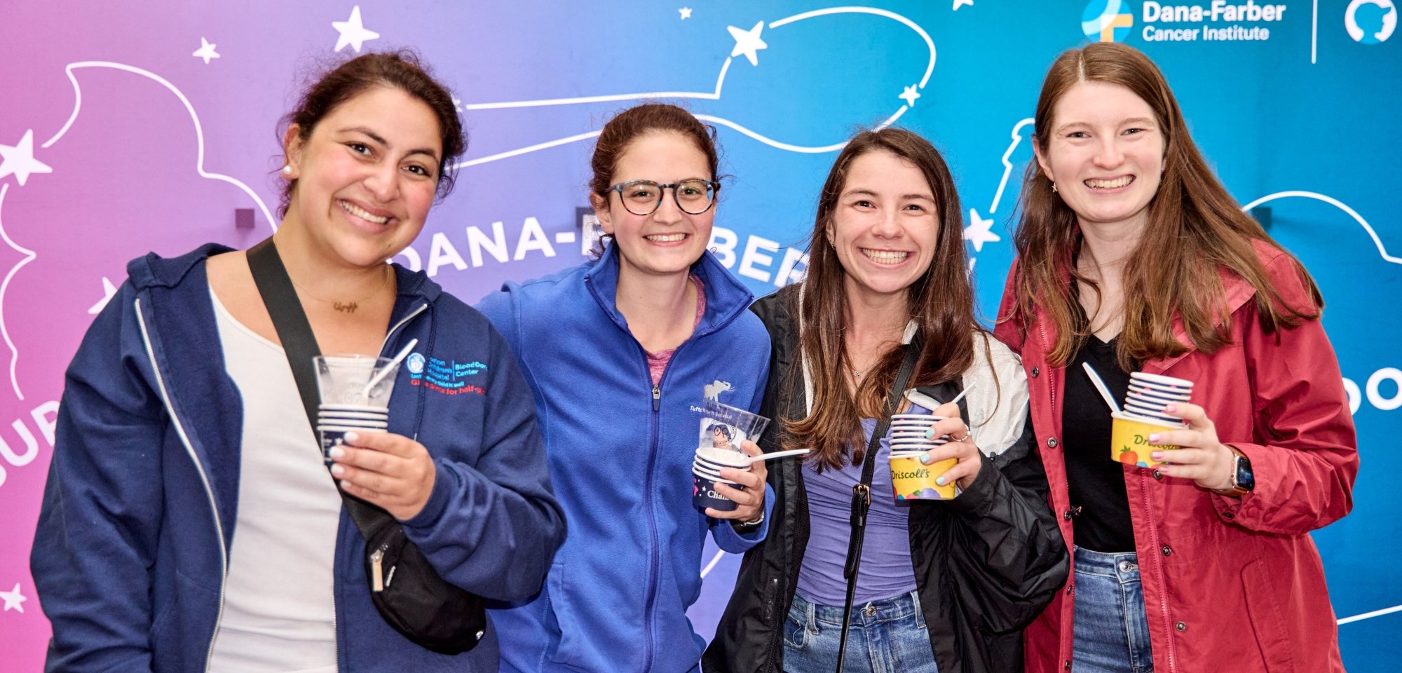 Four people with ice cream at the Jimmy Fund Scooper Bowl