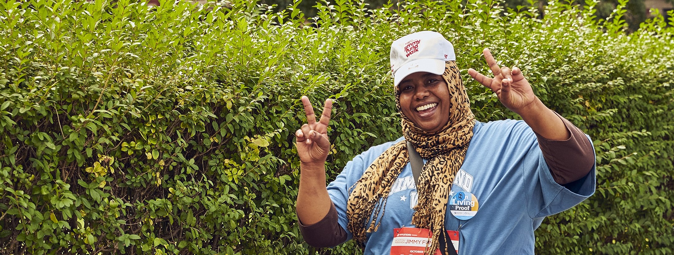 A Jimmy Fund Walk participant celebrating on the course