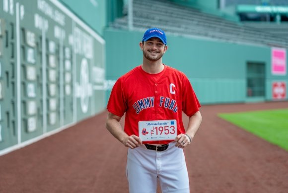 Garret Whitlock, Jimmy Fund Captain, with a Red Sox Foundation/Jimmy Fund license plate