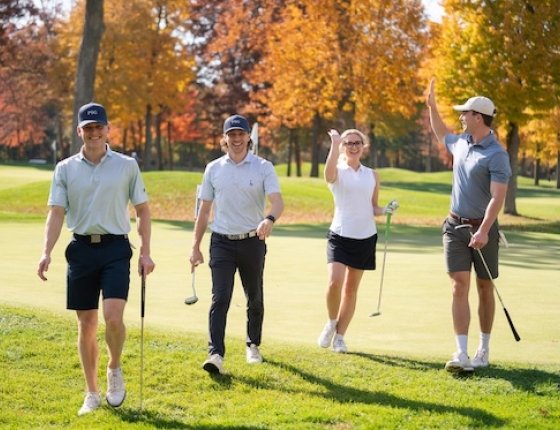 Four golfers smile at the 2024 Jimmy Fund Classic Golf Tournament