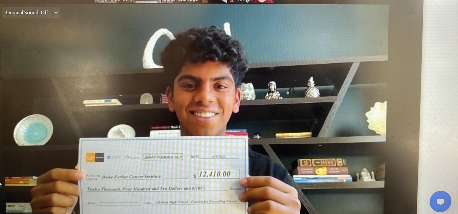 Ashwin with a check for Dana-Farber
