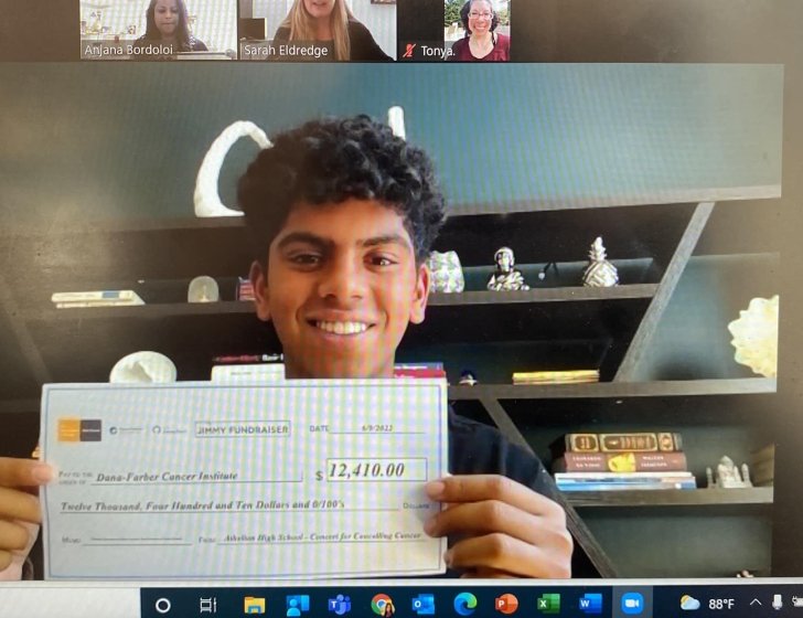 Ashwin with a check for Dana-Farber