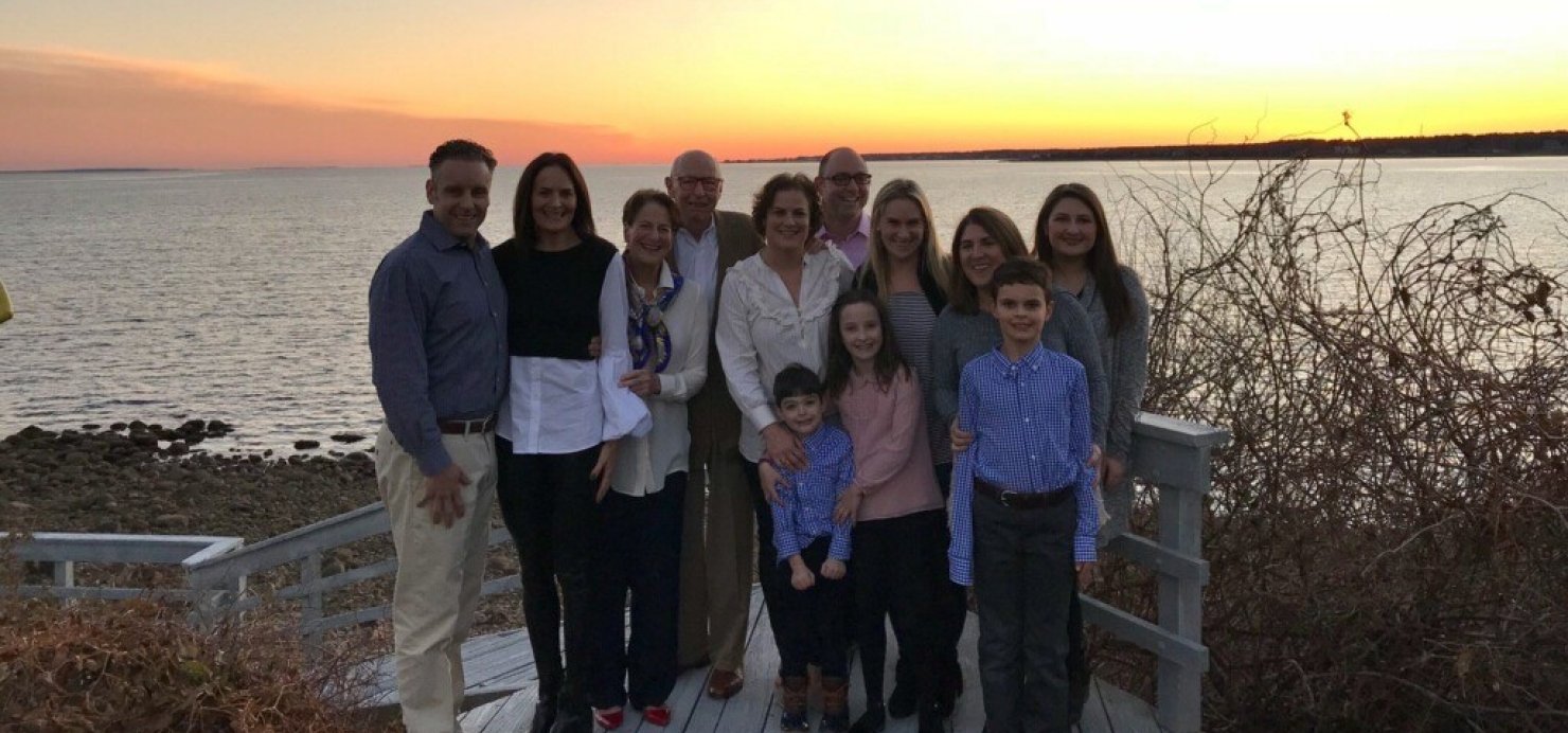 The Lane family at a beach during sunset