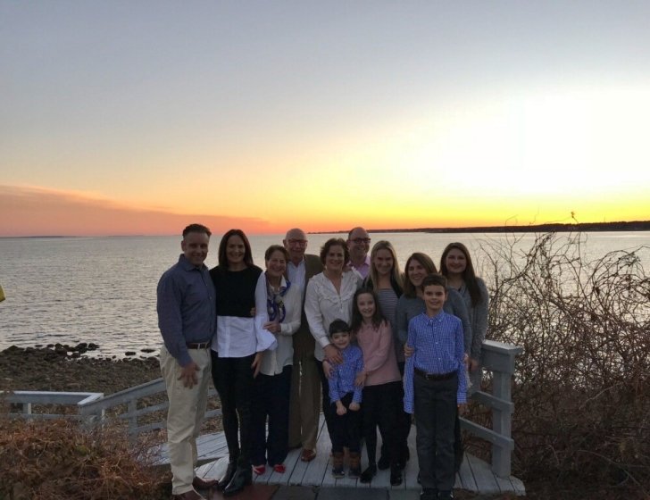 The Lane family at a beach during sunset