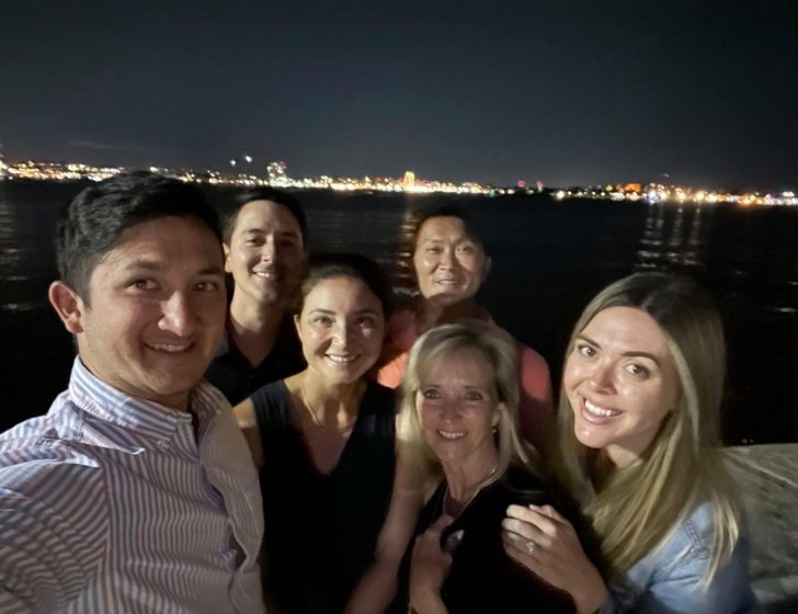 Nolan with family and friends at night 