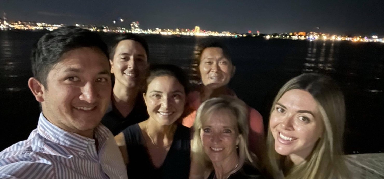 Nolan with family and friends at night