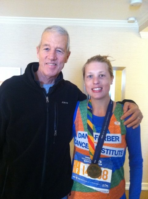 Michael and Allison stand together with Allison wearing Dana-Farber running singlet