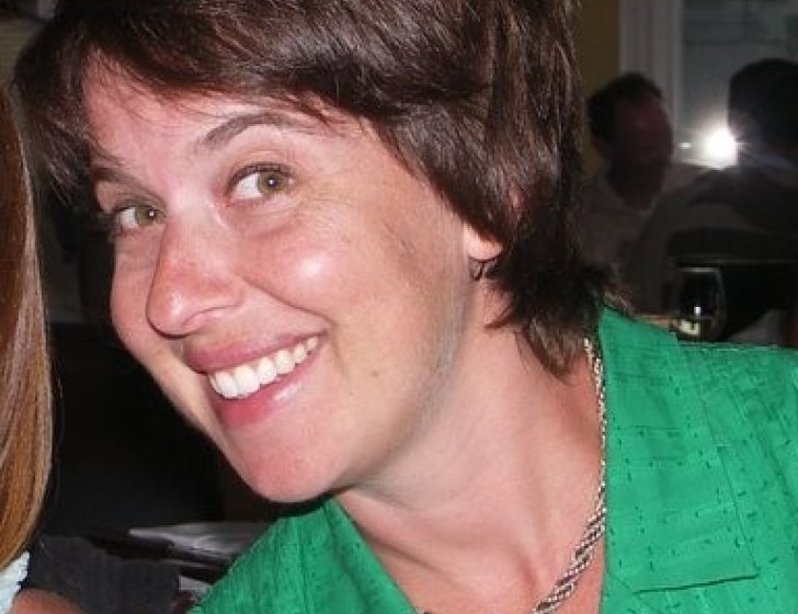 Jill smiles at camera