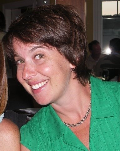 Jill smiles at camera