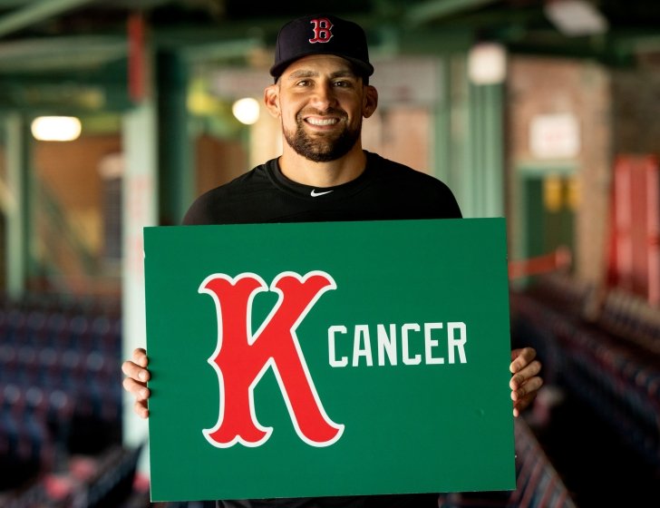 Nathan Eovaldi holding a K Cancer sign