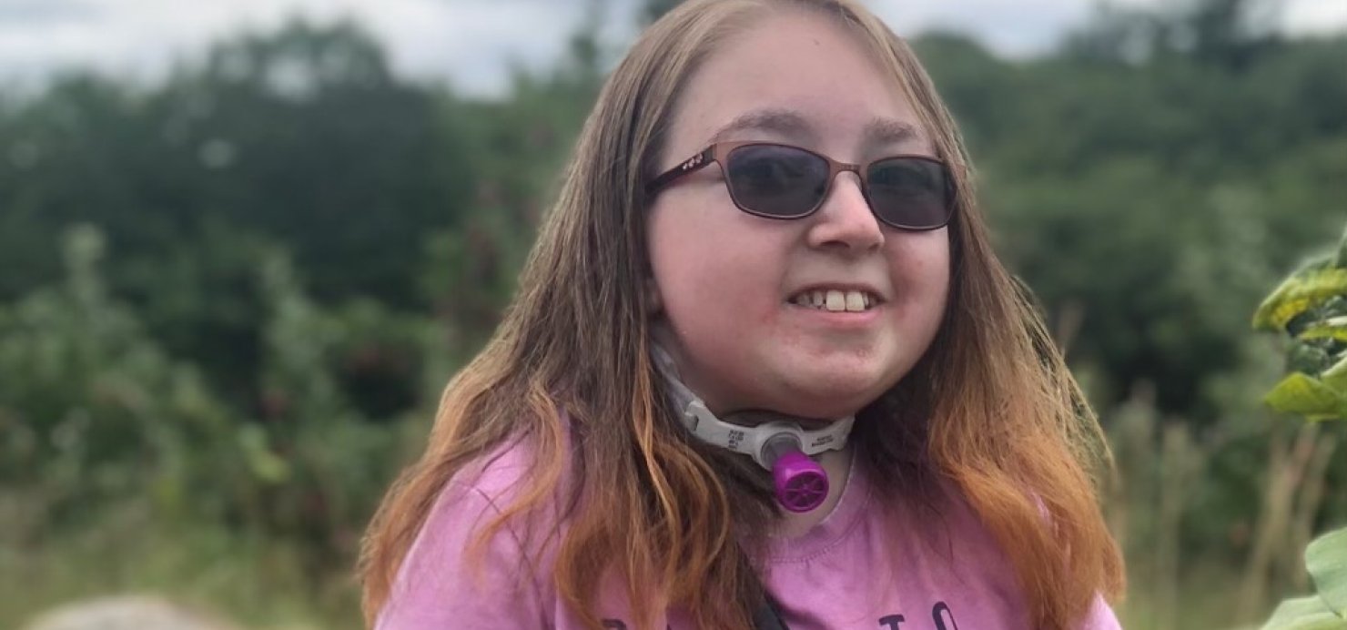 Hailey with her Golden Retriever service dog, Honor