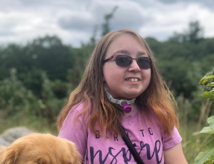 Hailey with her Golden Retriever service dog, Honor