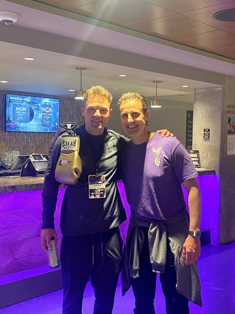 Aidan and Chris hug post-fight
