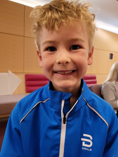 Emmett smiles at camera