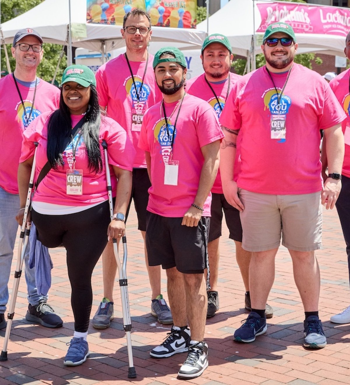 Scooper Bowl volunteers prepare to welcome attendees