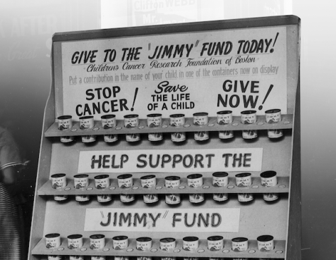 Black and white photo of an early Jimmy Fund display at Fenway Park