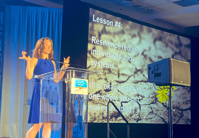Dr. Rosenberg giving a presentation at a conference